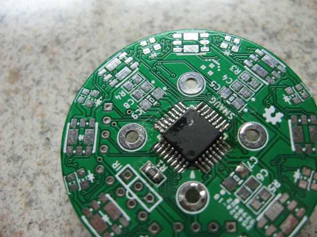PCB with ATmega168 fully soldered and all bridges removed