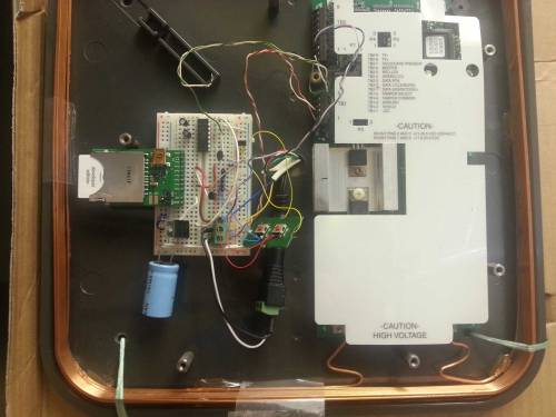 Prototype 4. Uses an Electric Imp instead of an Arduino. MOSFETs and MAX232 are level shifters. Giant capacitor was for troubleshooting an Arduino freezing problem detailed in "Problems encountered" section.